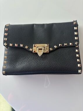 Valentino Black Pebbled Leather Clutch with Gold Stud Accents